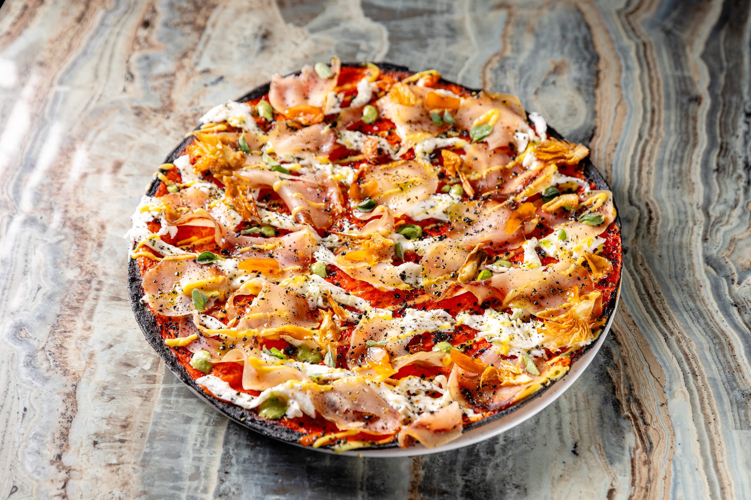 Pizza Capricciosa, perché si chiama così e la sua grande rinascita